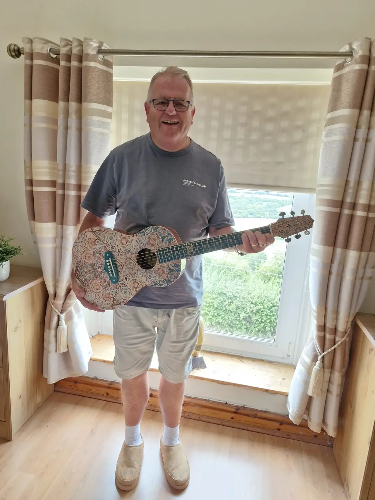 Winner photo for W28 Lindo Sahara Steel Strings Electro Acoustic Travel Guitar (Short Scale)